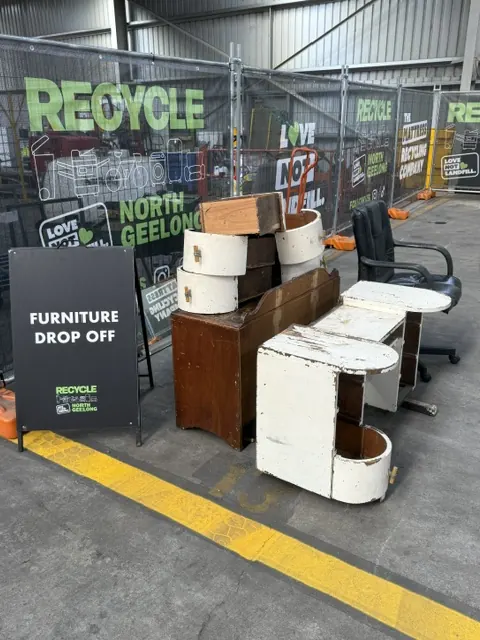 Furniture set down at the furniture drop-off sign